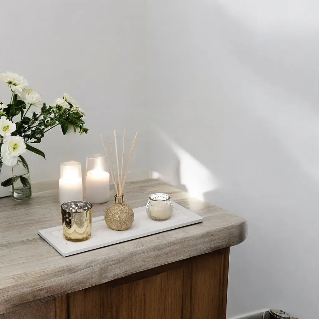 Diffuseur de parfum et bougie dorée : Set d'ambiance aux reflets or luxe