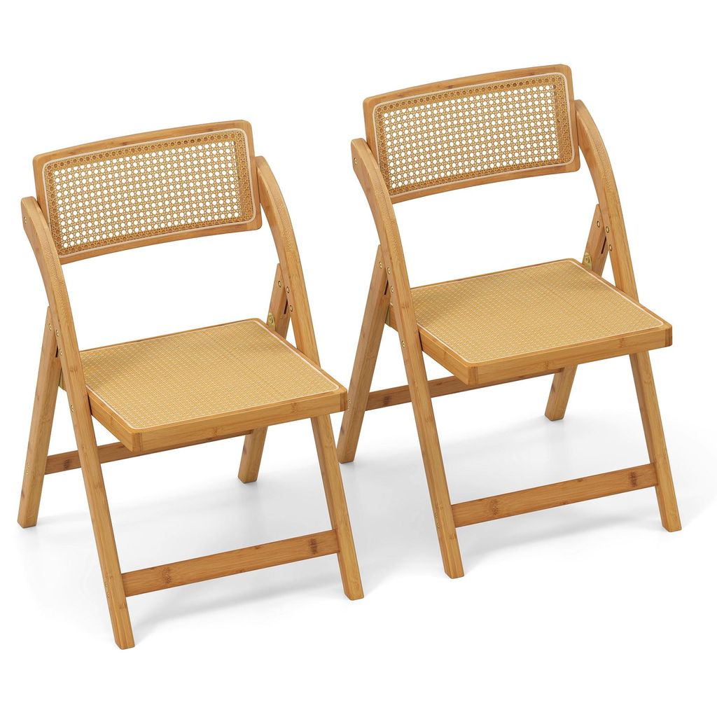 Two folding chairs made of bamboo with rattan backrests.
