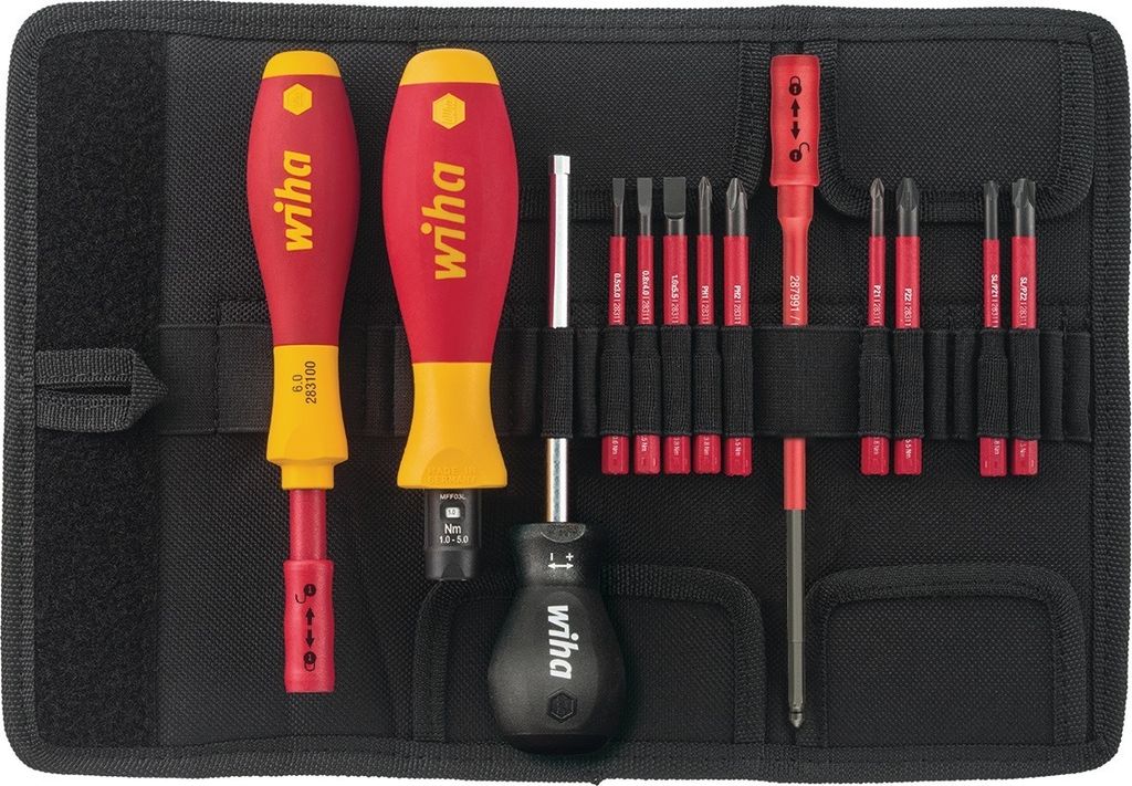 A set of screwdrivers and bits laid out in a black fabric organizer.