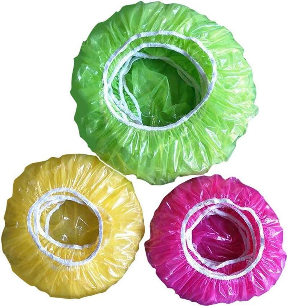 Three colorful shower caps are arranged in a cluster on a white background.