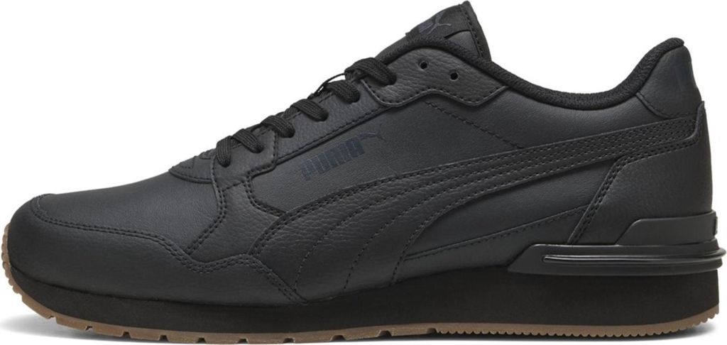 A black Puma sneaker is shown from the side against a white background.