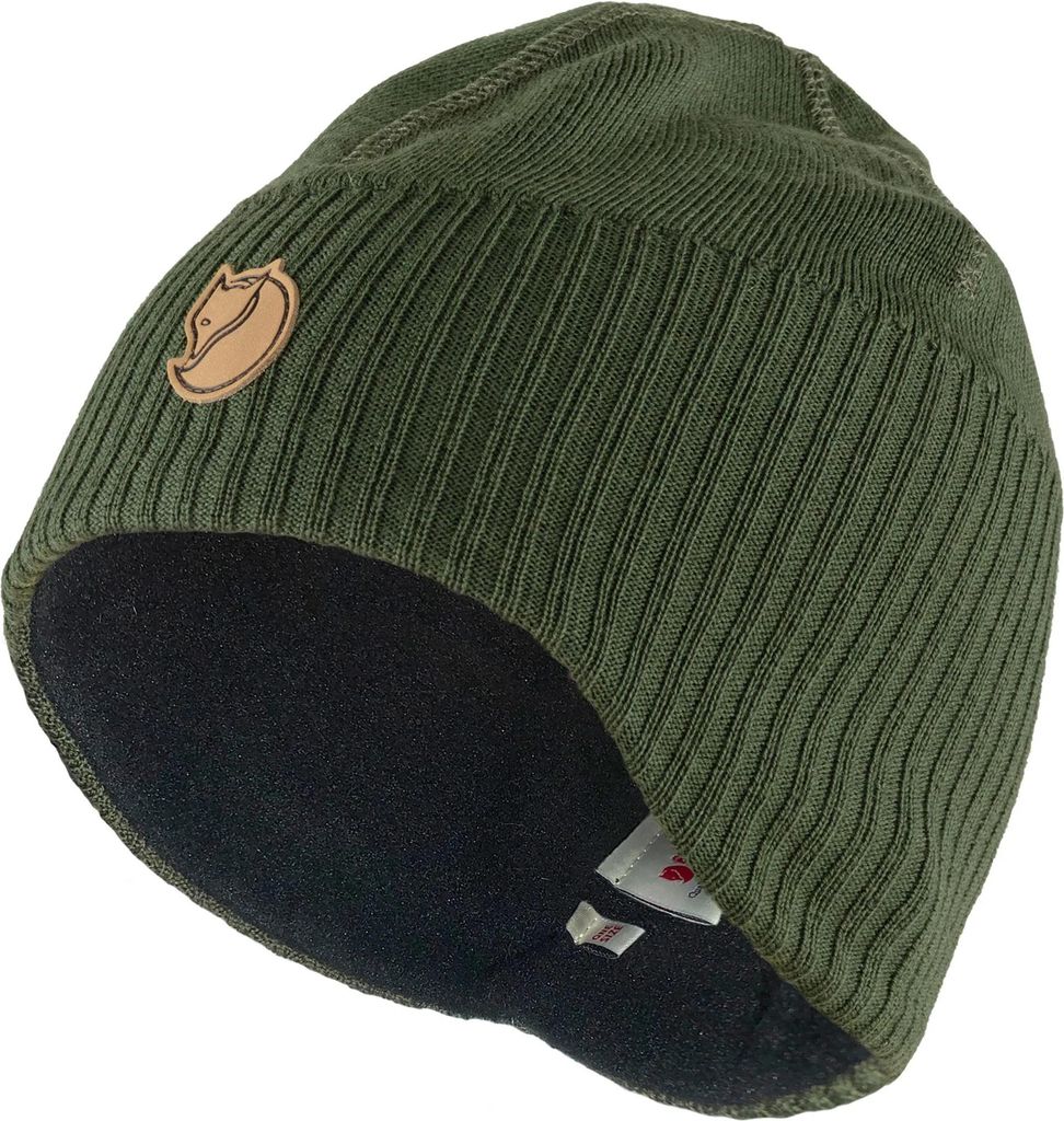 A green knitted beanie with a brown logo patch.