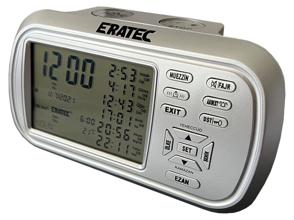 A digital alarm clock with a large display showing time and prayer times.