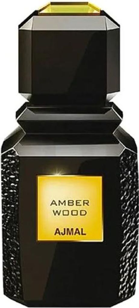 A black perfume bottle with a gold label.
