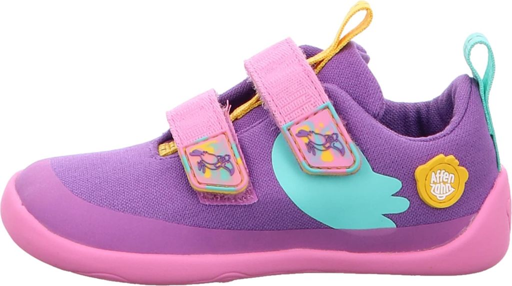 Side view of a child's shoe.