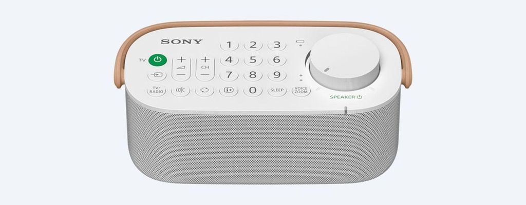 A white Sony SRS-LSR200 portable speaker with a wood-grain accent on a white background.