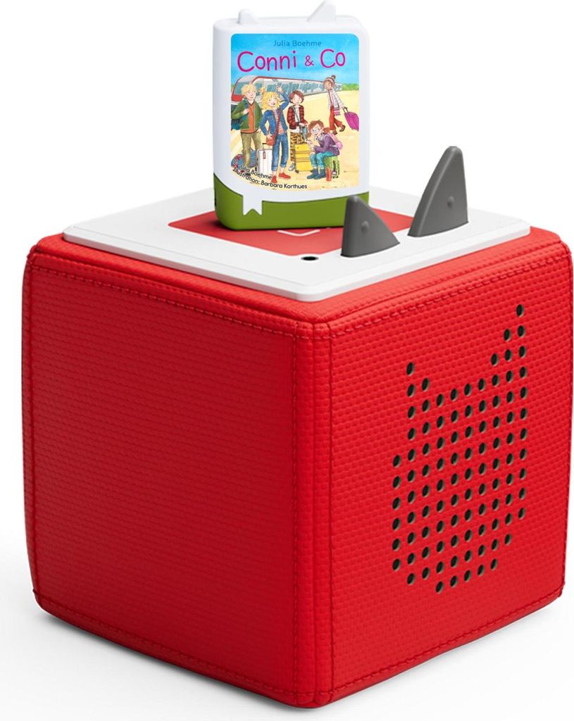 A red audio player with a book on top.
