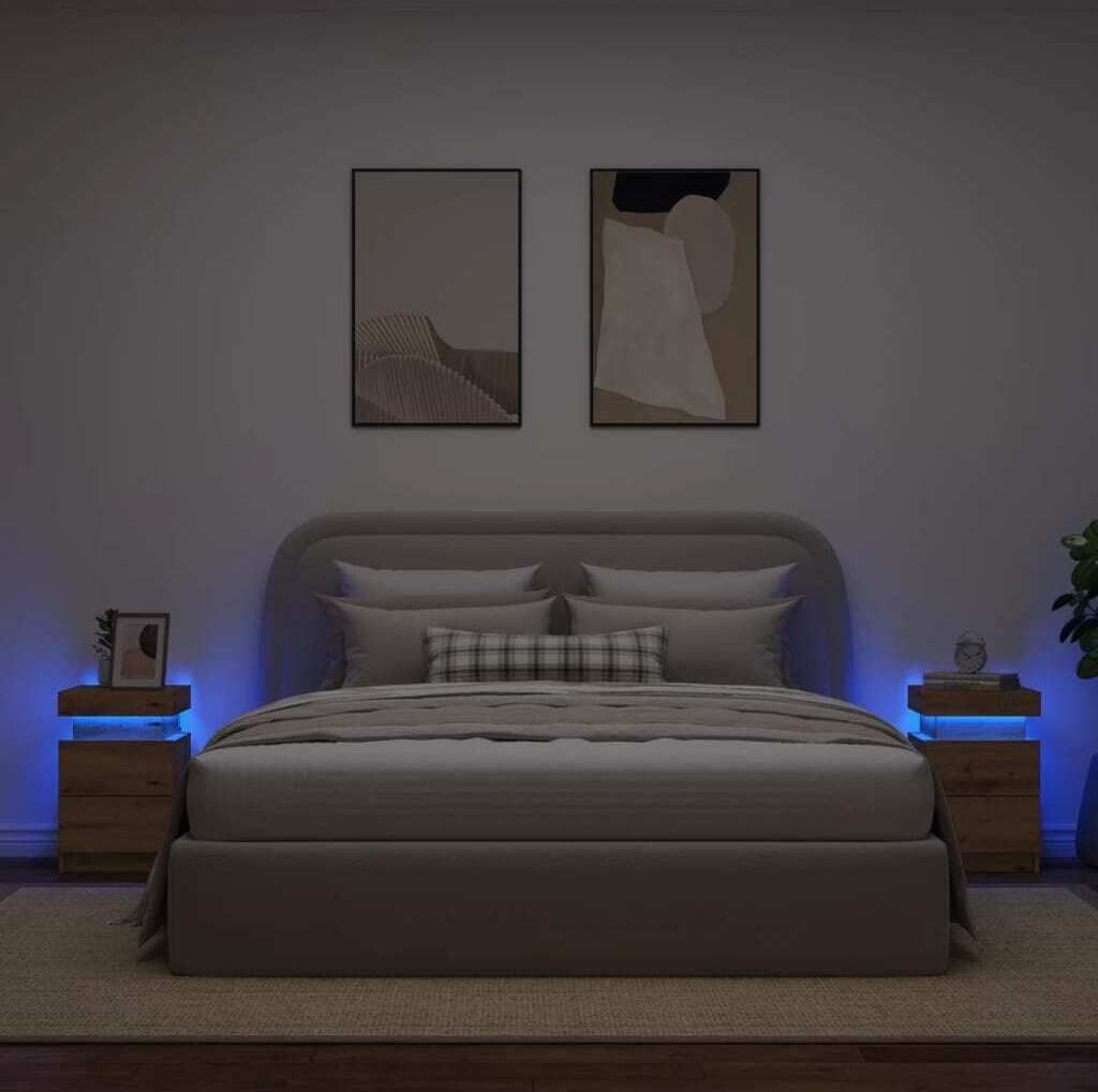 A bedroom scene with a bed and two nightstands.