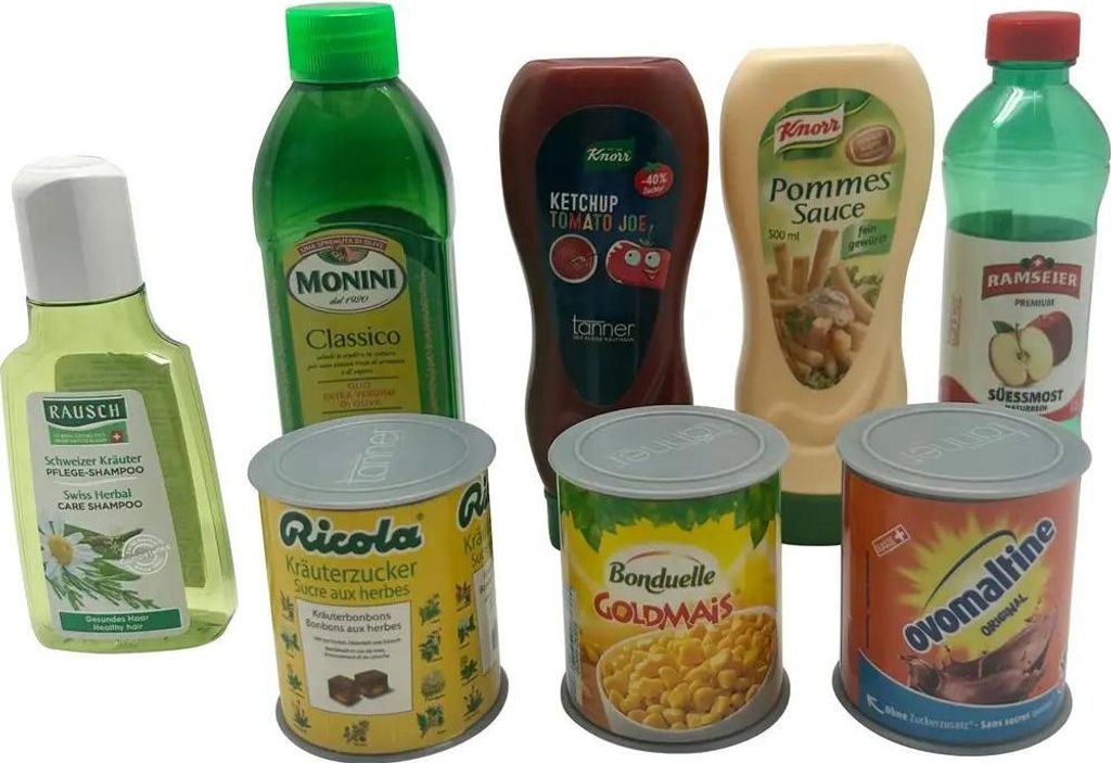 A collection of various food and personal care products arranged on a white background.