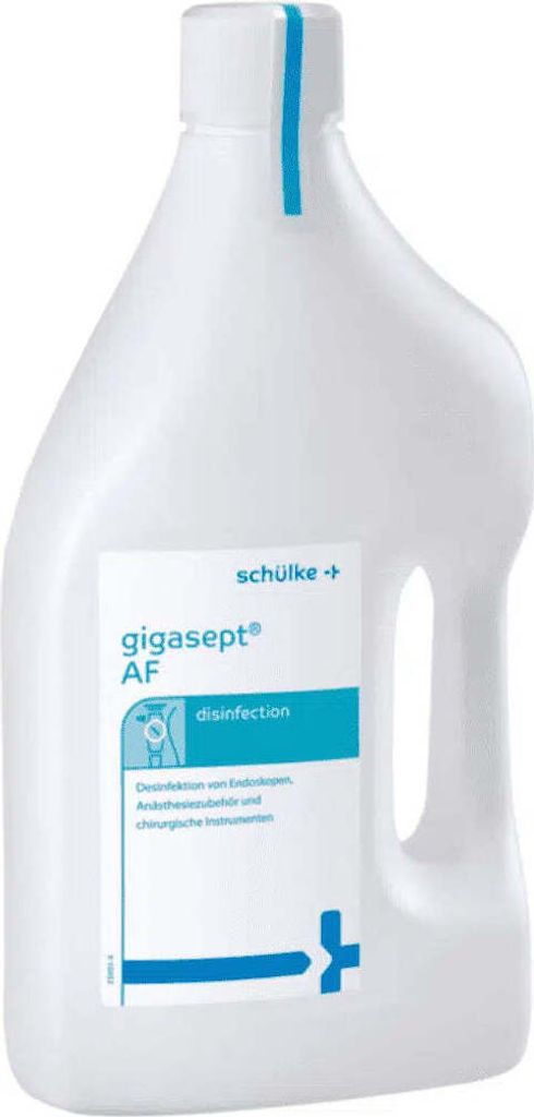 A white plastic bottle of disinfectant with a label.
