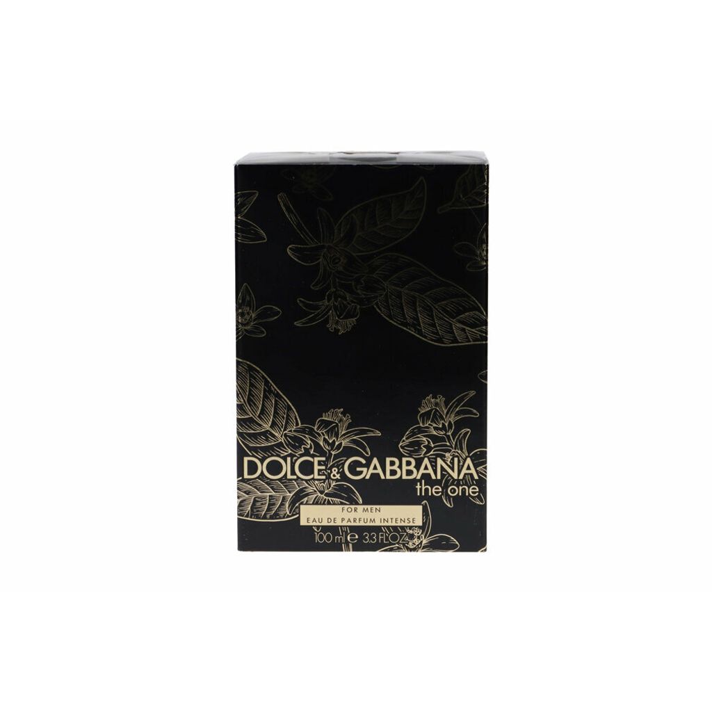 A black box with gold floral patterns and text.
