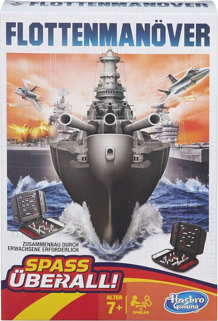 The image shows the front of a board game box for 'Flottenmanöver'. The box features a dramatic illustration of battleships and fighter jets in action, with two game boards visible in the foreground.