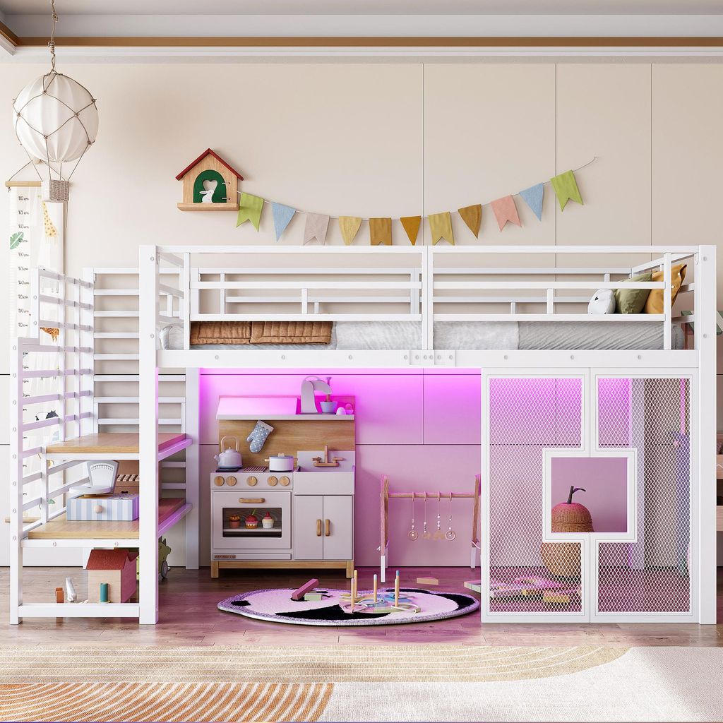 A child's bedroom with a white loft bed, a play kitchen, and various toys.