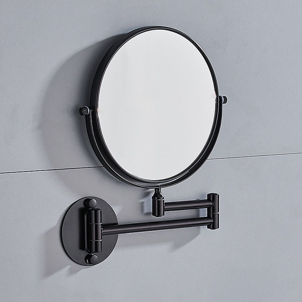 A black, wall-mounted, extendable makeup mirror is shown against a gray tiled wall.