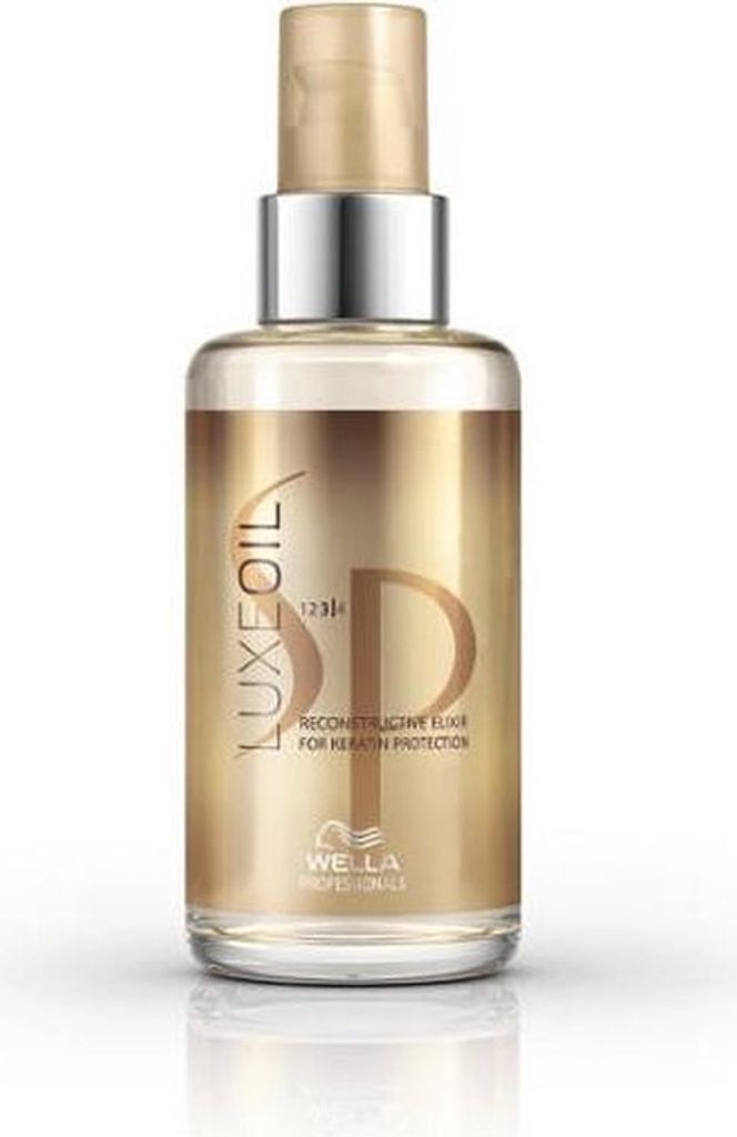 A product shot of a bottle of hair oil.