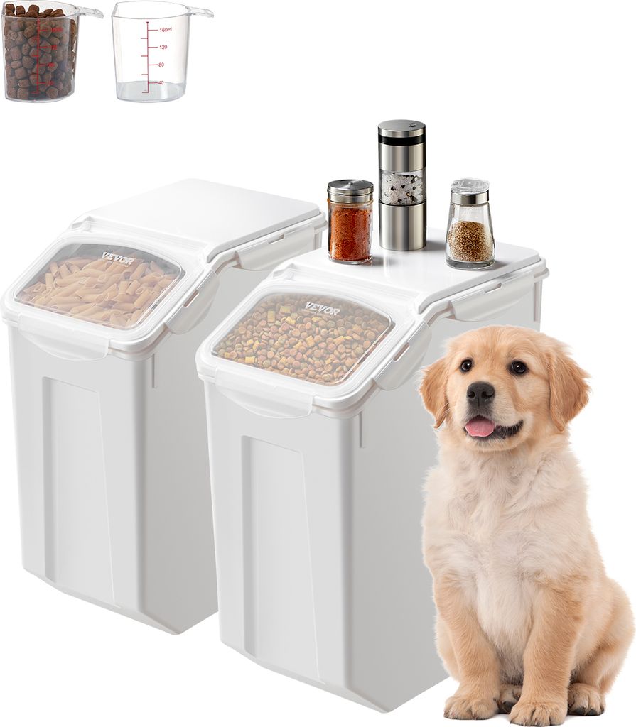 A golden retriever puppy sits next to two white pet food storage containers.
