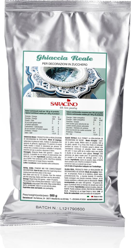A silver foil bag containing powdered icing mix, with a label showing product details and an image of decorated icing.