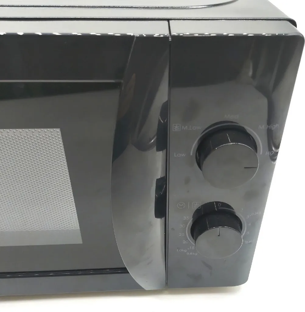Petit micro-ondes 20L Candy CMW20SMB idéal pour réchauffer et cuisiner - 12