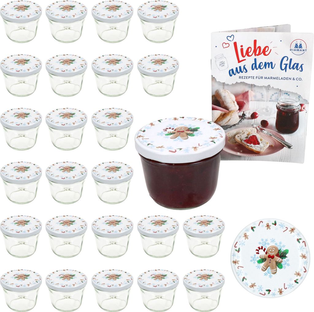 A set of glass jars with lids, a recipe book, and a decorative plate, all with a Christmas theme.