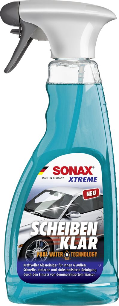 A spray bottle of SONAX XTREME Scheiben Klar glass cleaner.