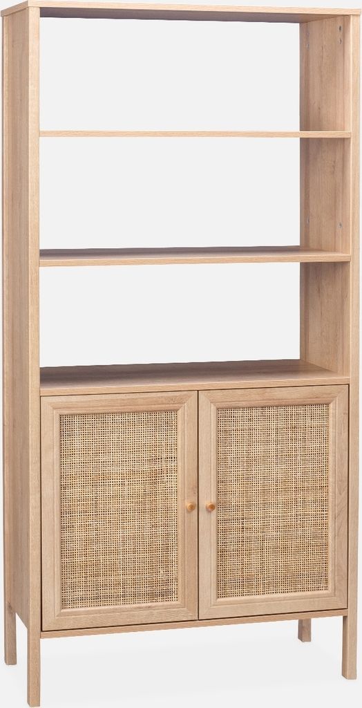 A light wood bookshelf with cane doors.