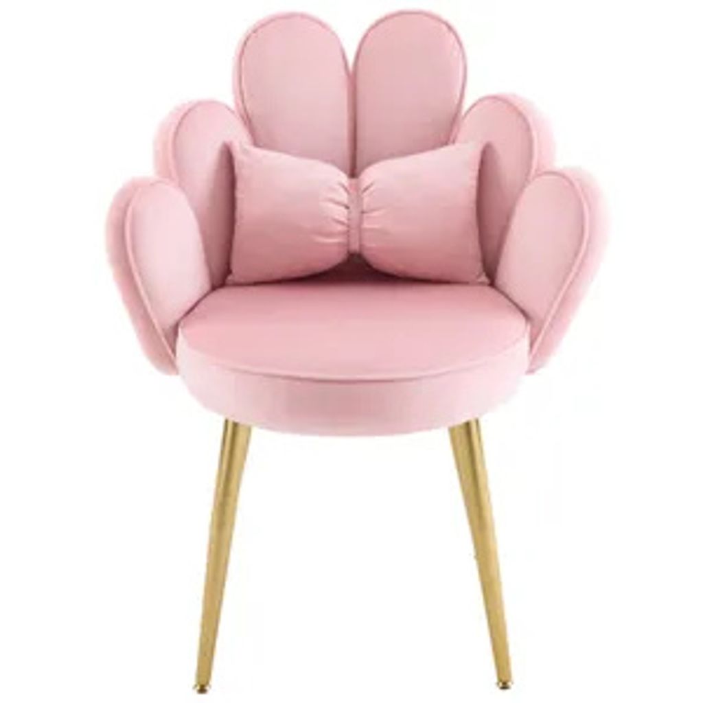 A pink velvet chair with a bow-shaped cushion.