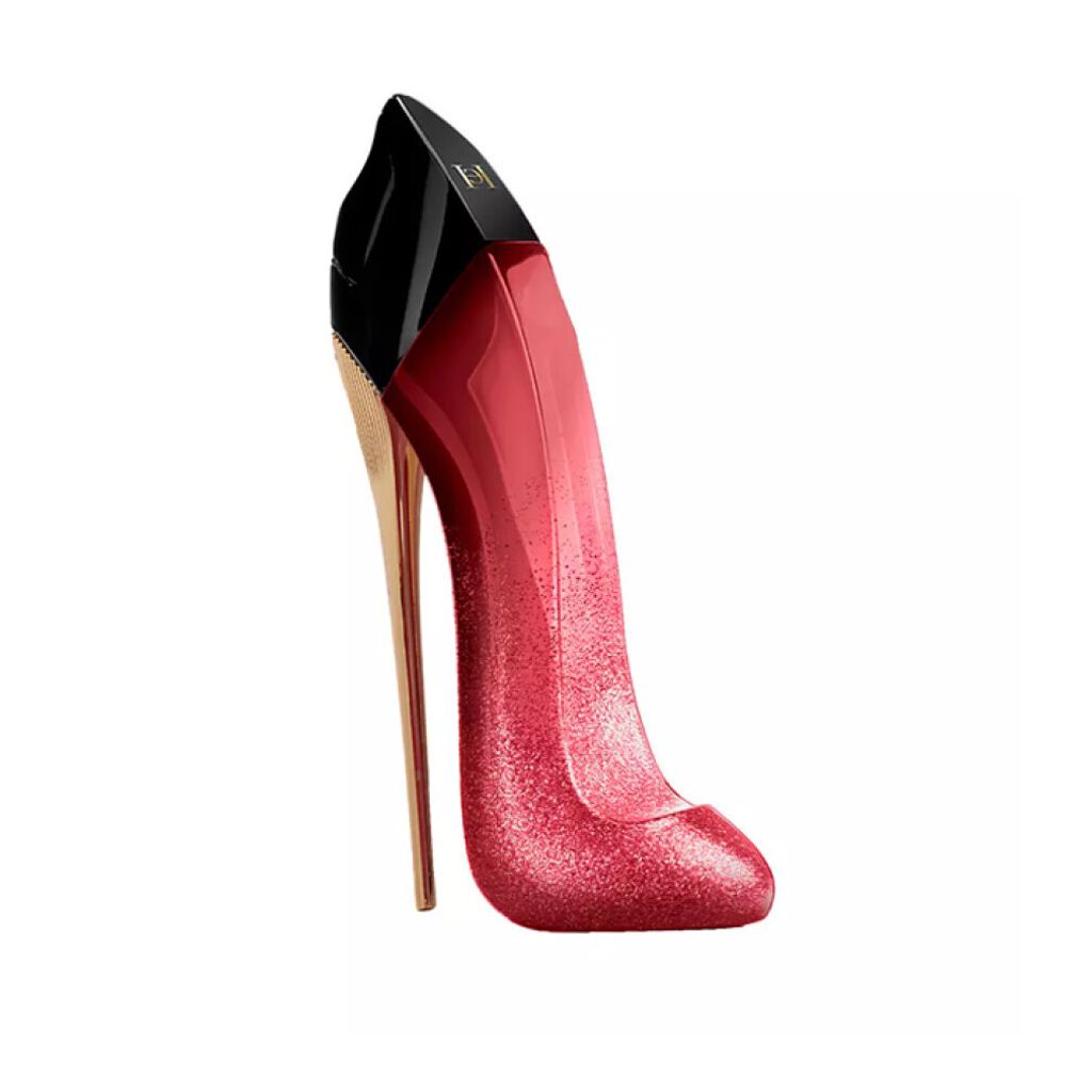 A red, glittery high-heeled shoe shaped perfume bottle with a black cap and gold stiletto heel, isolated on a white background.