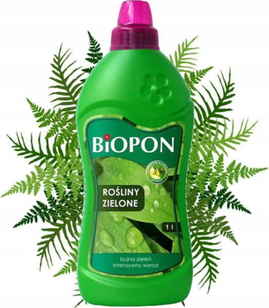 A bottle of Biopon liquid fertilizer for green plants, surrounded by fern leaves.