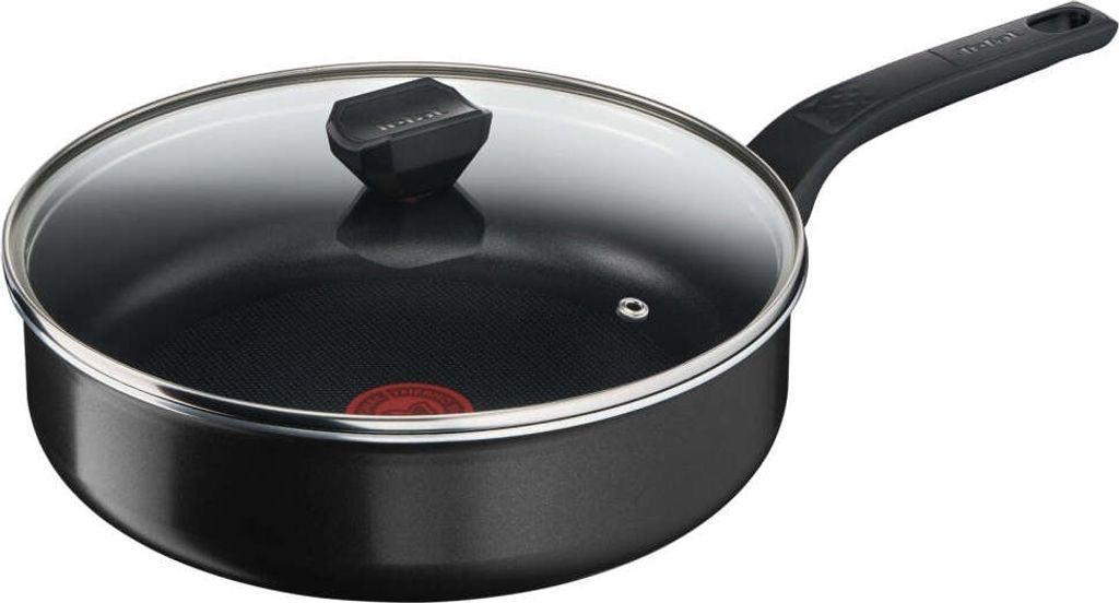 A black frying pan with a glass lid and a black handle, shown from a slightly elevated side angle against a white background.