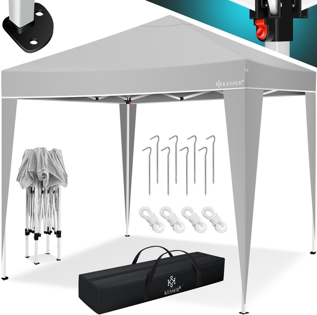 A gray pop-up canopy tent with its accessories laid out.