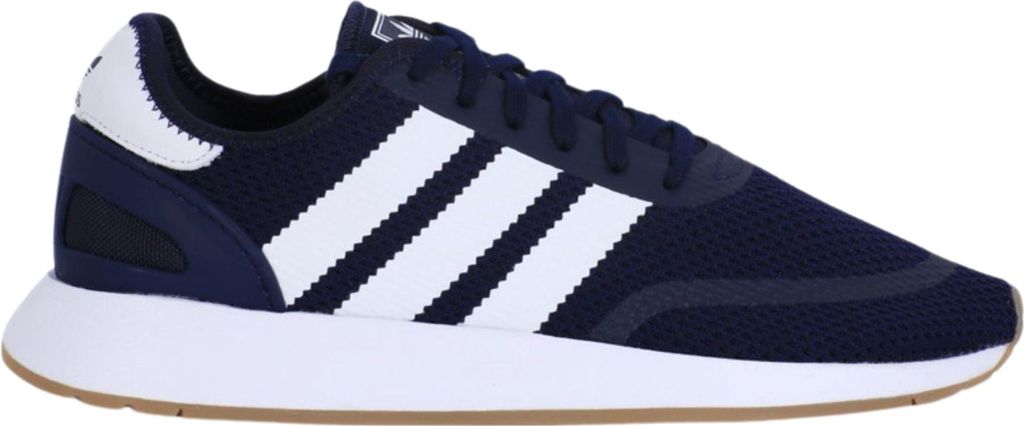 A side view of a navy blue Adidas sneaker with white stripes.