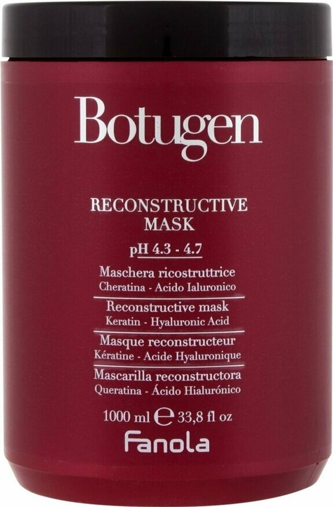 A close-up of a burgundy colored hair mask jar with white text.