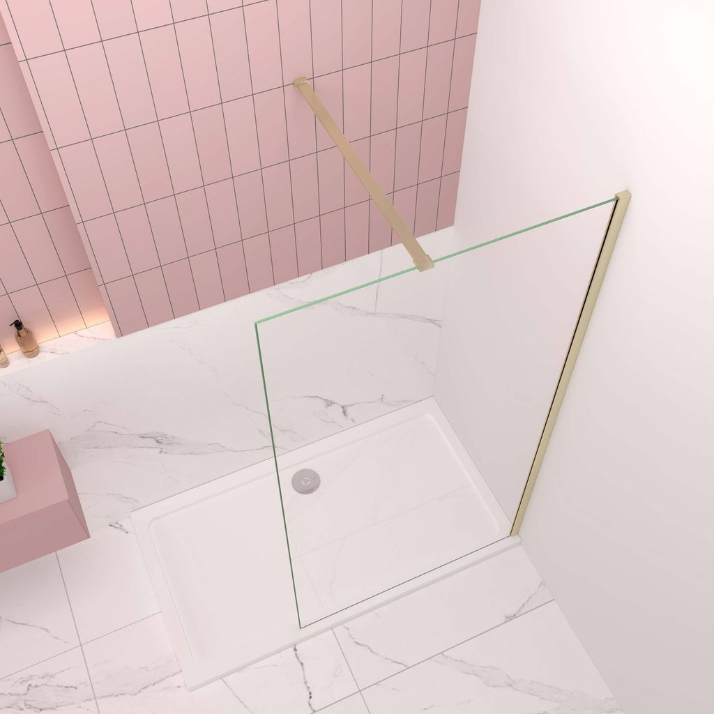 A modern bathroom corner with a glass shower enclosure and pink tiled walls.