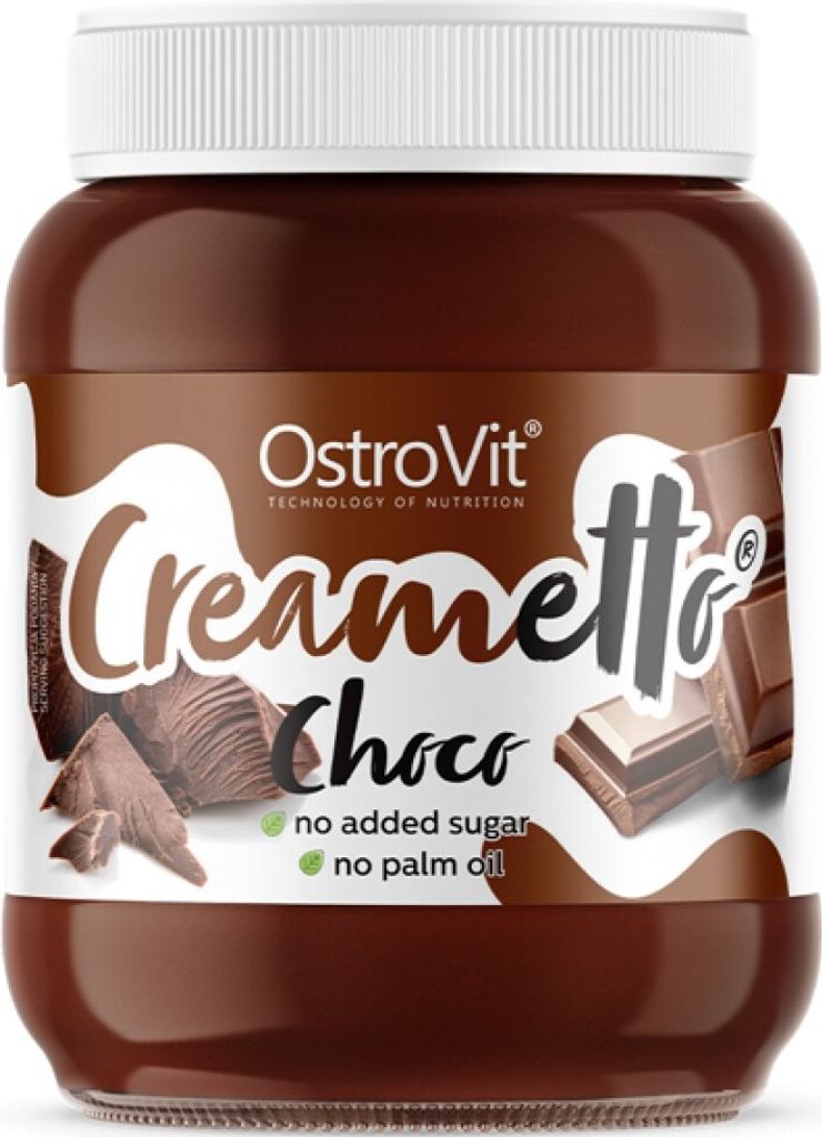 A jar of chocolate spread with chocolate pieces on a white background.