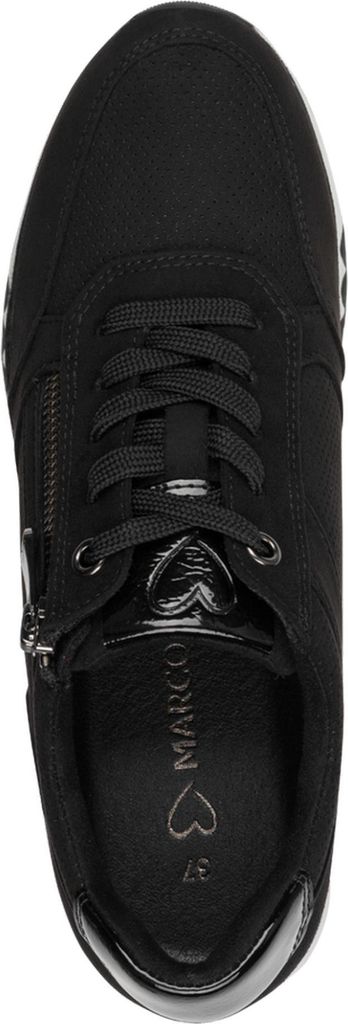 A top-down view of a black sneaker.