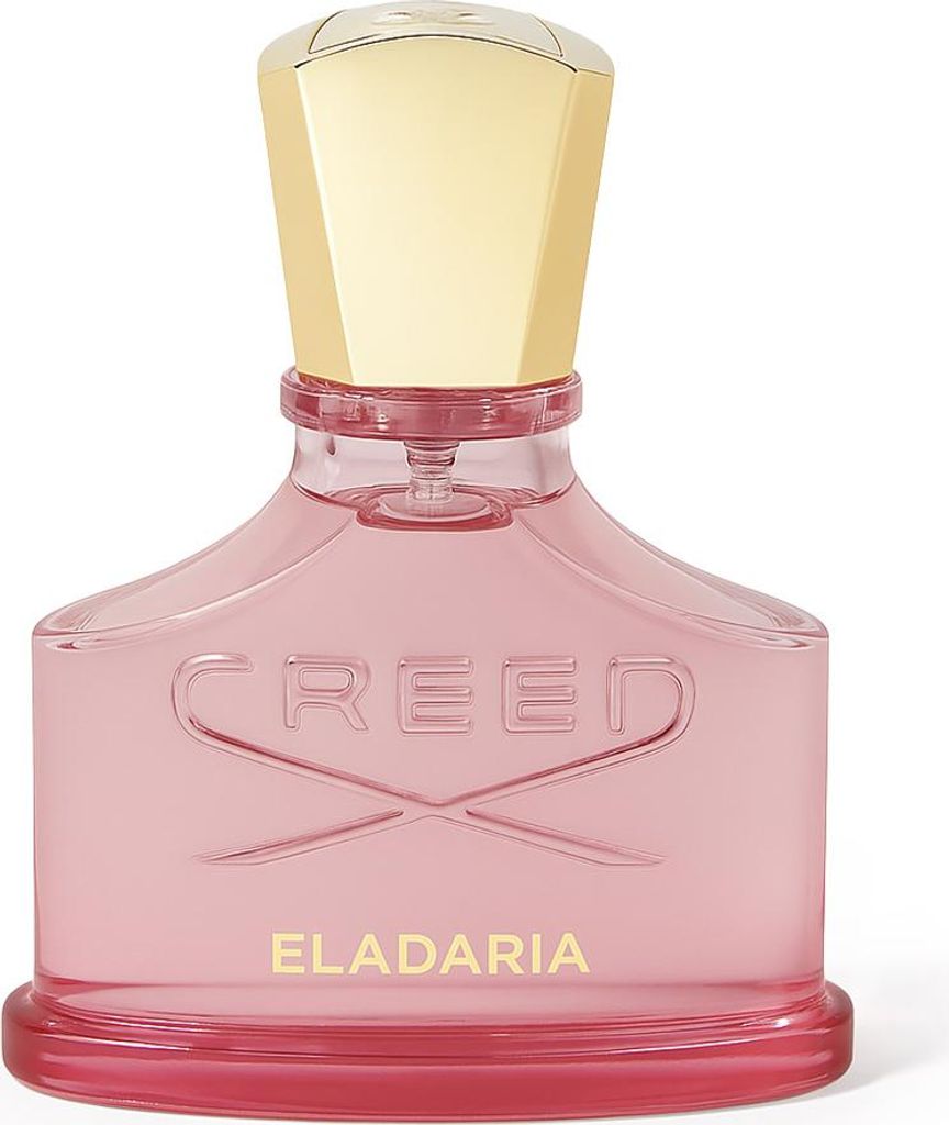 A pink glass perfume bottle with a gold cap.
