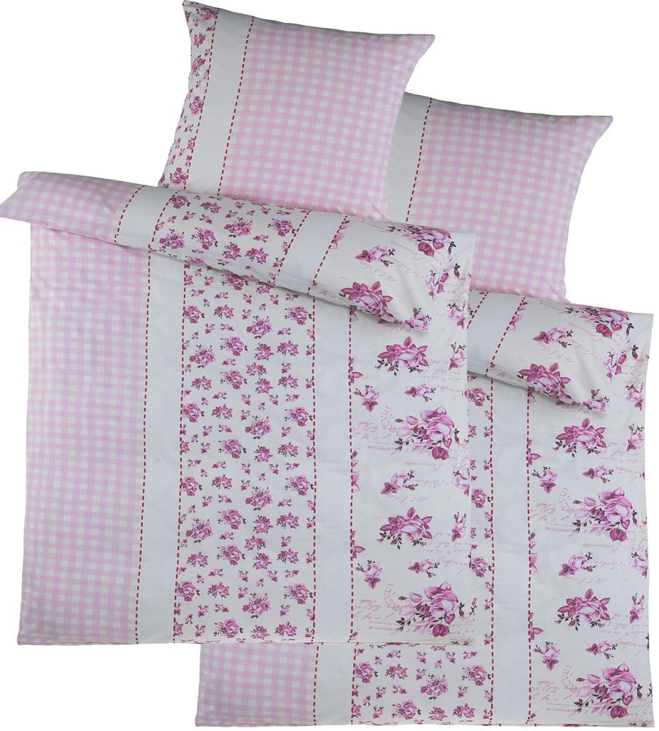 A neatly folded set of bedding with a pink gingham pattern and a floral design.