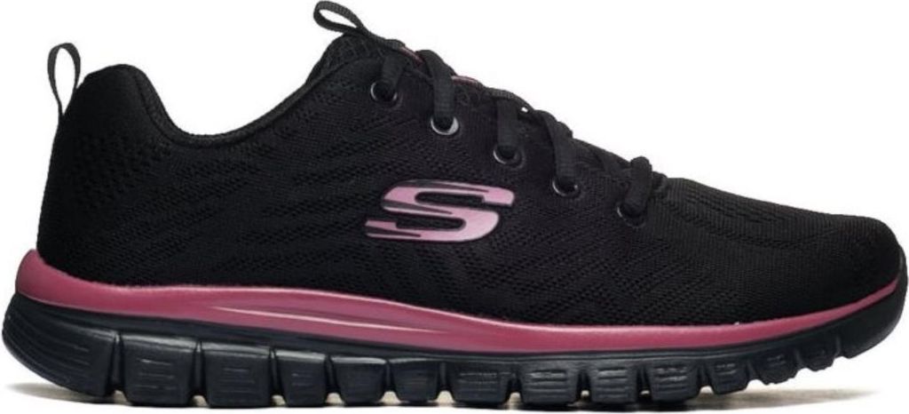 A side view of a black Skechers women's athletic shoe with pink accents.