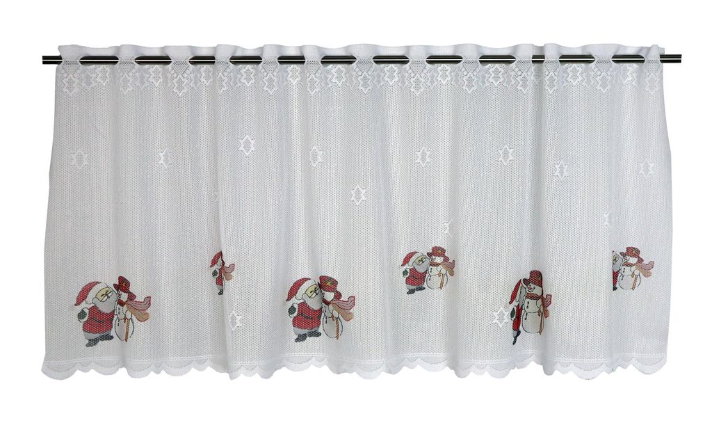 A white lace curtain with embroidered Christmas figures.