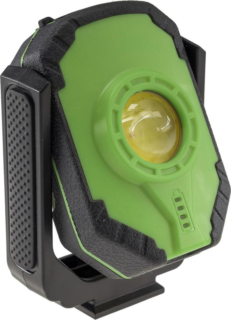 A close-up, angled view of a green and black LED work light with a yellow lens, mounted on a black bracket.