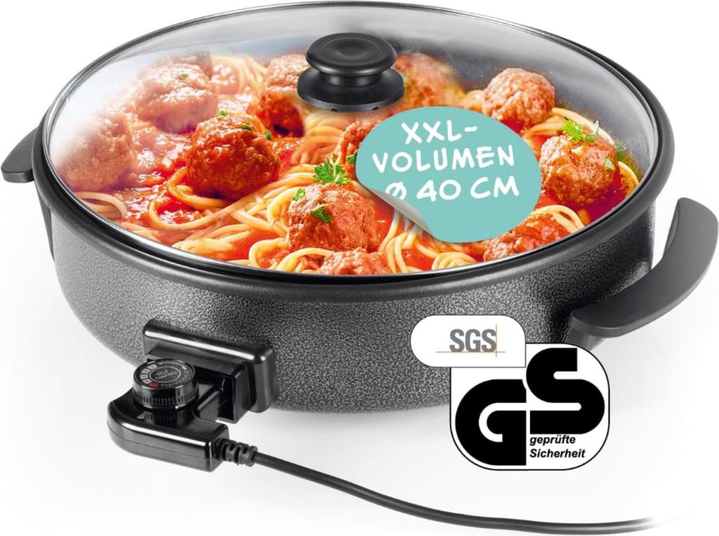An electric pizza pan filled with spaghetti and meatballs, with marketing labels and safety certifications visible.