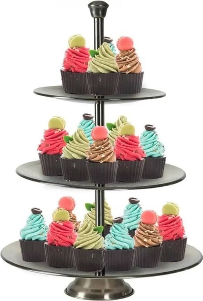 A three-tiered cake stand filled with cupcakes.