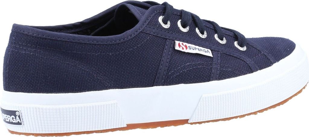 A side view of a navy blue Superga sneaker with a white sole and brown outsole.