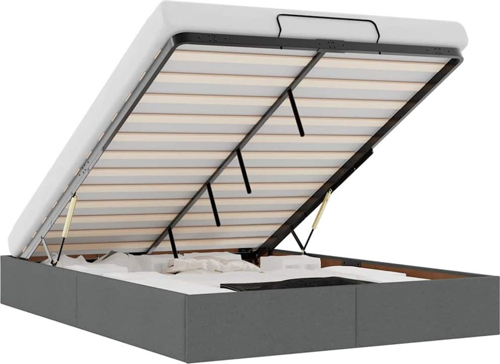 The image shows the underside of an open ottoman bed frame, revealing the slatted mattress support and the lifting mechanism.