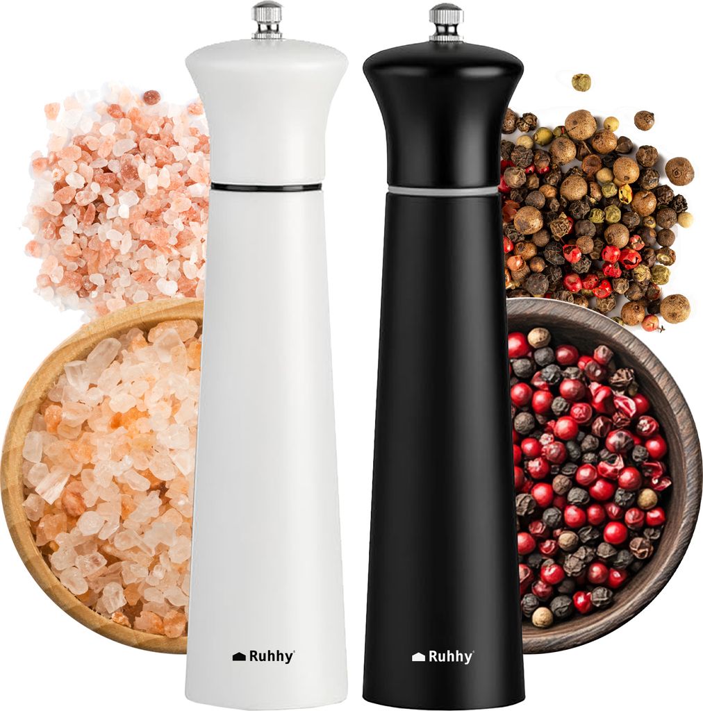 Two spice grinders, one white and one black, are displayed with salt and peppercorns.