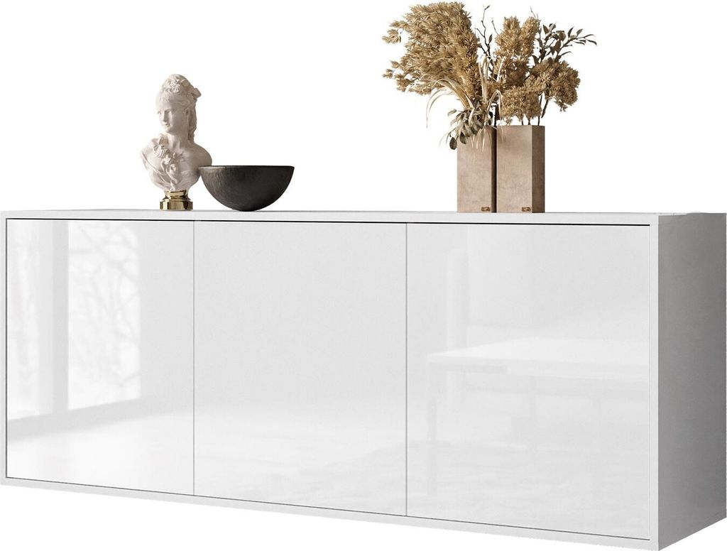 A white, high-gloss sideboard with three doors, decorated with a bust, a bowl, and a vase with dried flowers.