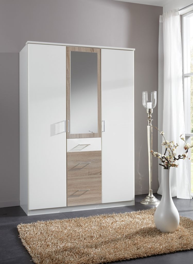 Kleiderschrank "Click" aus Spanplatte in Weiß mit 3 Schubladen und 3 Türen. Abmessungen (B/H/T) 135x198x58 cm