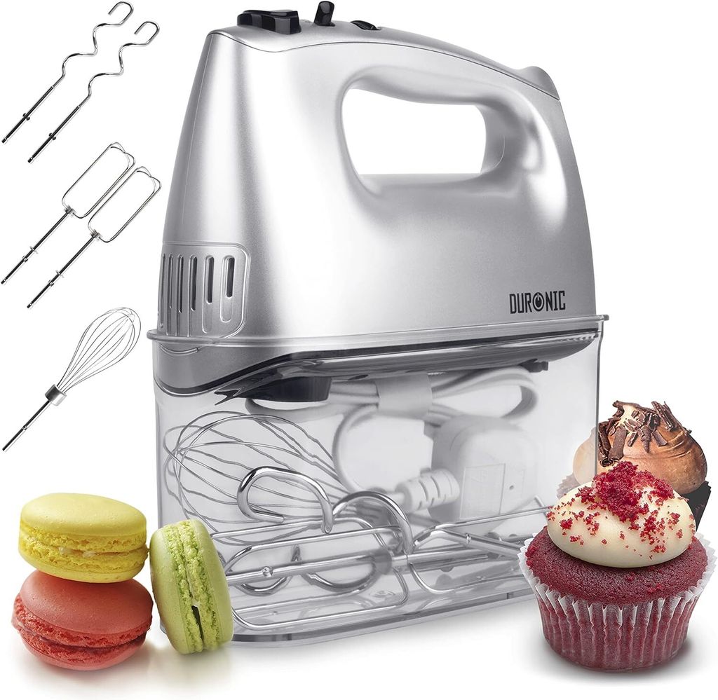 A silver electric hand mixer with various attachments shown next to colorful macarons and a red velvet cupcake.