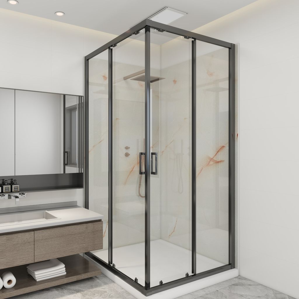 A modern bathroom with a glass shower enclosure and a vanity.