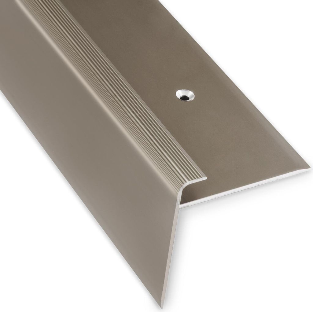 A close-up, angled view of a bronze-colored stair nosing profile against a white background.